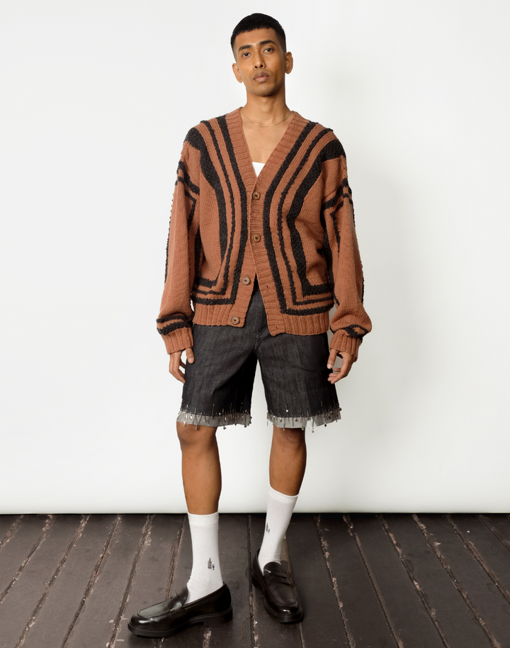 brown hand-knit wool cardigan with oversized fit, V-neck, and chunky grey outlines by Taarini Anand