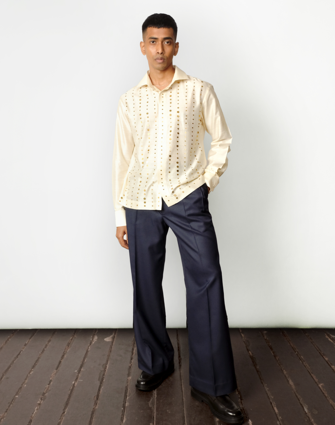 Relaxed fit cream handloom silk shirt with gold sequin stripes and concealed, crafted in India by Taarini Anand for men