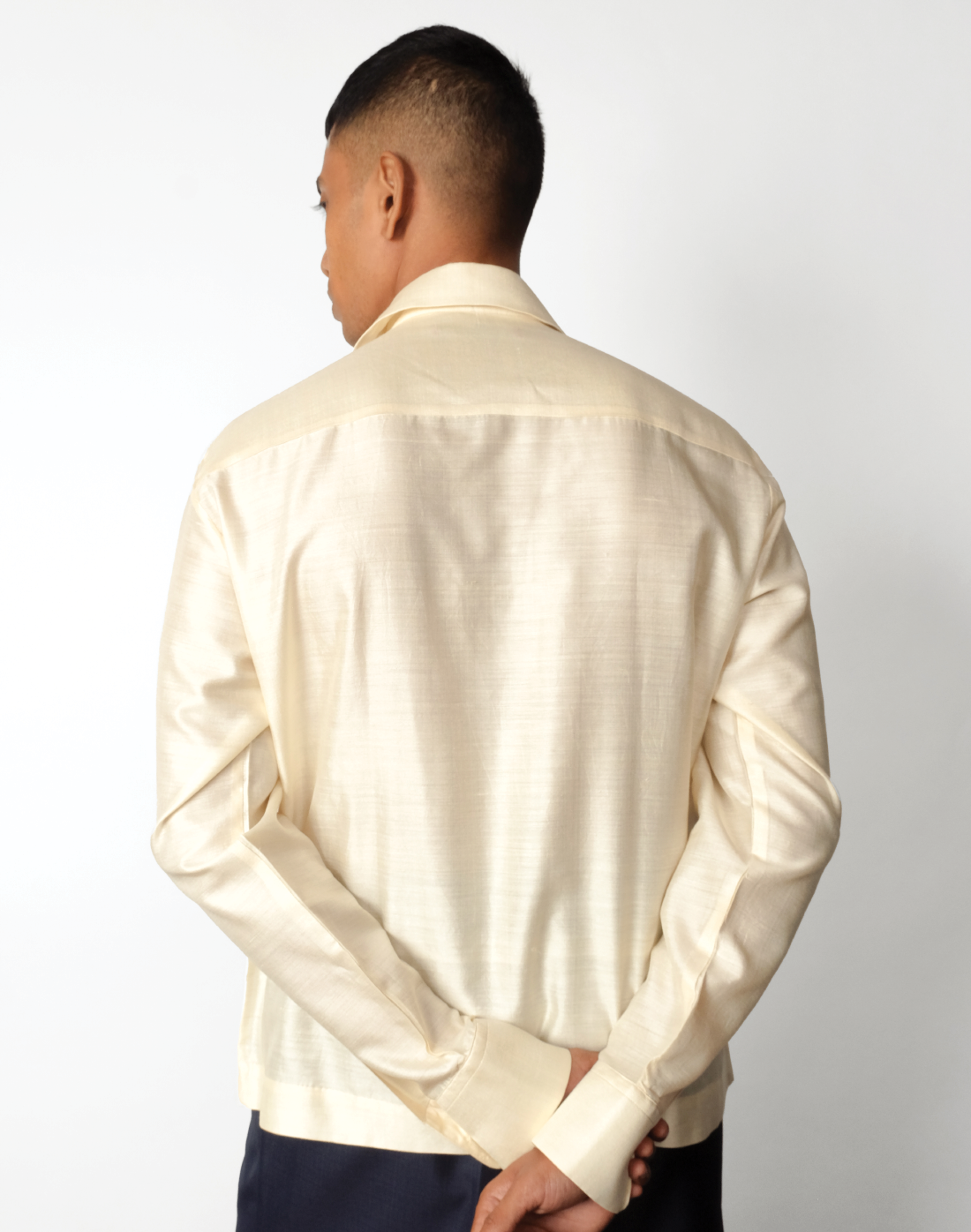 Relaxed fit cream handloom silk shirt with gold sequin stripes and concealed, crafted in India by Taarini Anand for men back