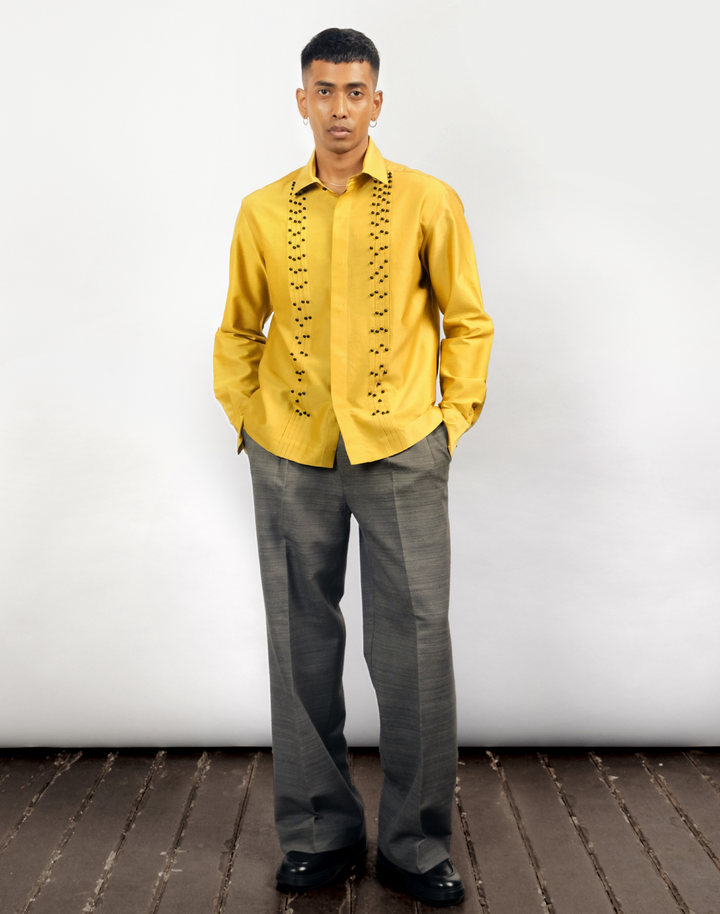 Taarini Anand Dilli Silk Shirt in mustard silk with pintucks, kantha stitches and black glass bead embroidery