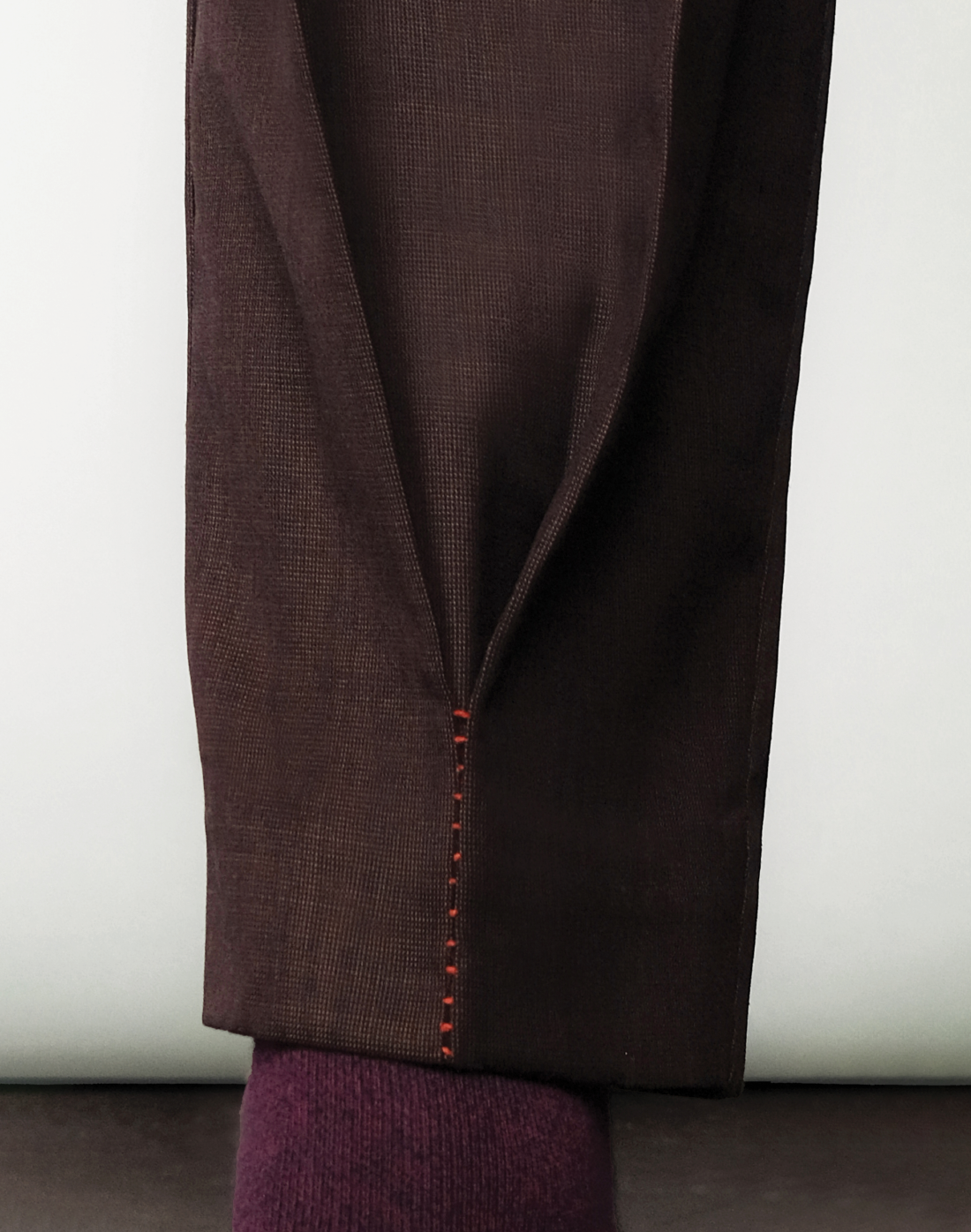 Taarini Anand double box pleat balloon-cut trousers in dark brown
