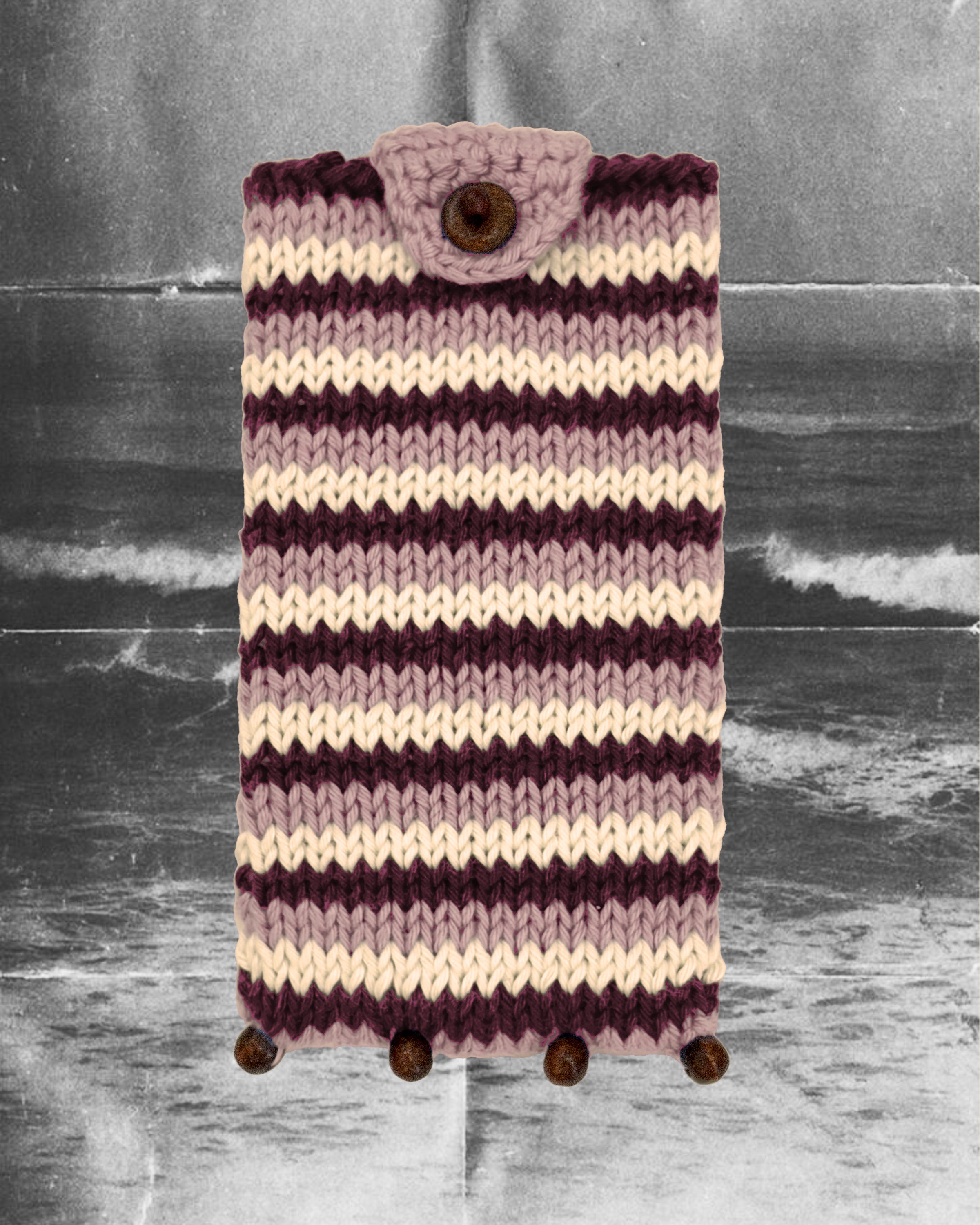 Hand-knitted mauve Eye Candy Pouch in cotton with wooden beads by Taarini Anand