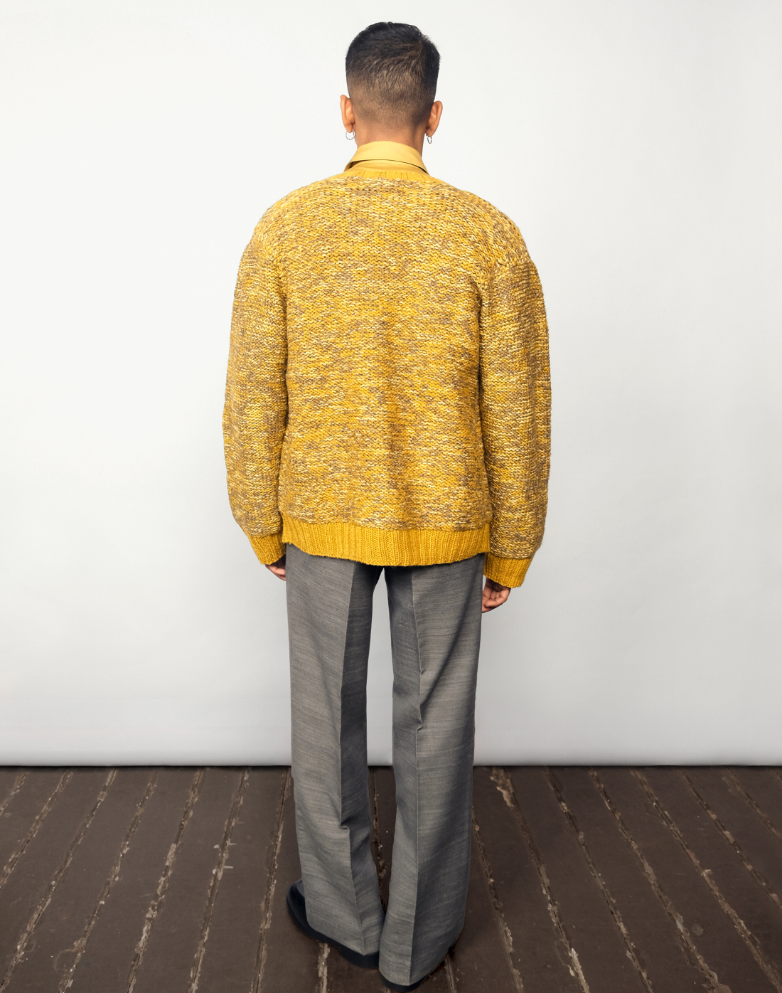 Taarini Anand hand-knit maize cardigan in yellow melange with ceramic buttons.