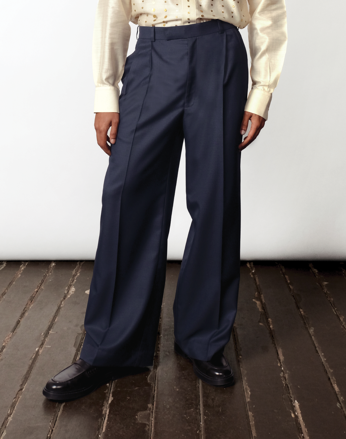 High-rise pleated cotton wide-leg trousers in navy by Taarini Anand