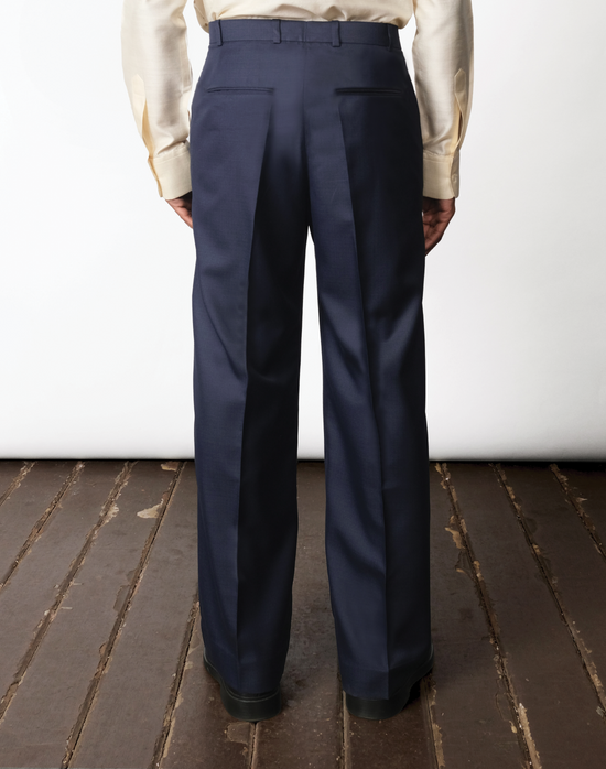 High-rise pleated cotton wide-leg trousers in navy by Taarini Anand