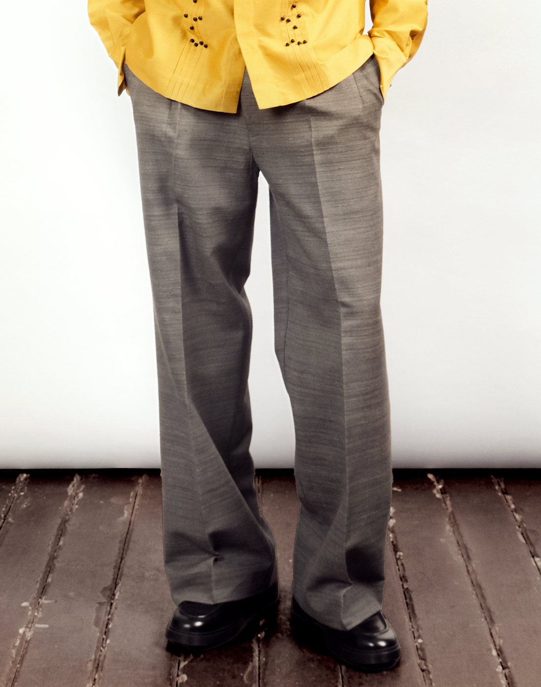 front view Taarini Anand Nocturne grey handloom silk trousers with pleated wide-leg silhouette and tailored finish