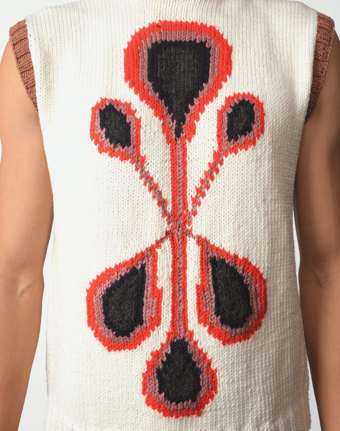 Intarsia Prism Logo Sweater Vest by Taarini Anand — cream knit with ombré triple-logo pattern
