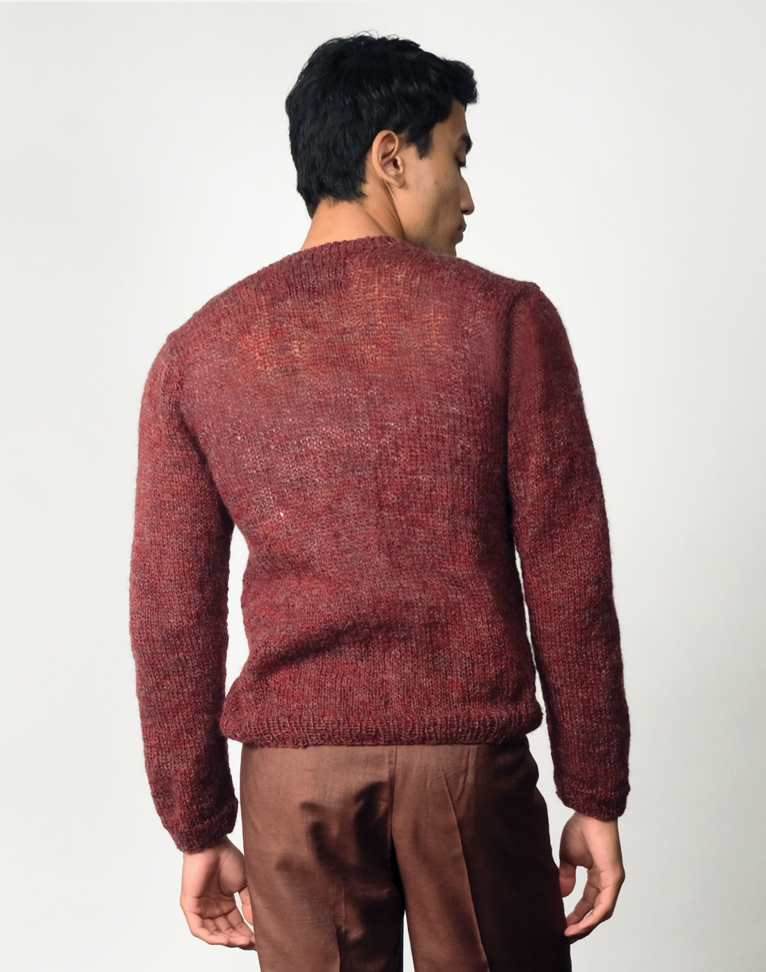 back Mulberry Cardigan by Taarini Anand, a hand-knitted cropped cardigan in maroon-grey melange mohair wool blend.