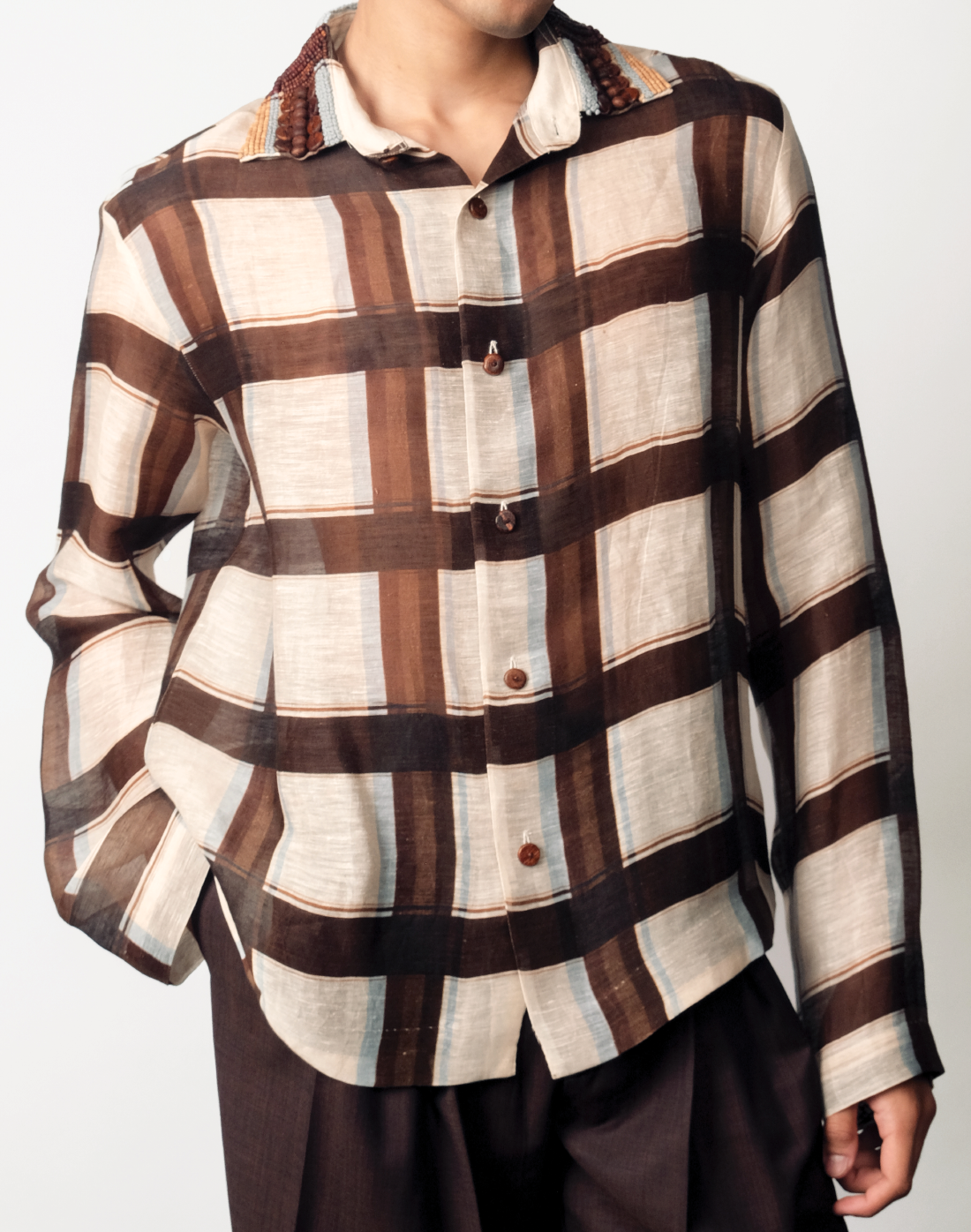 Taarini Anand Wood Checker Shirt in handloom silk-linen with embroidered wooden-bead collar and buttons