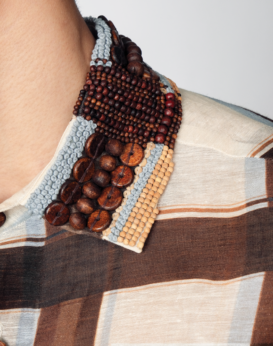 Taarini Anand Wood Checker Shirt in handloom silk-linen with embroidered wooden-bead collar and buttons